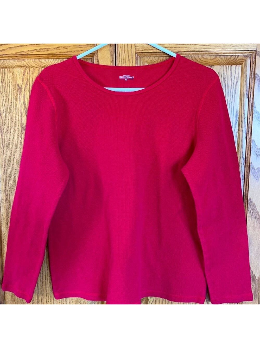 Northern Reflections pull over top size XL.